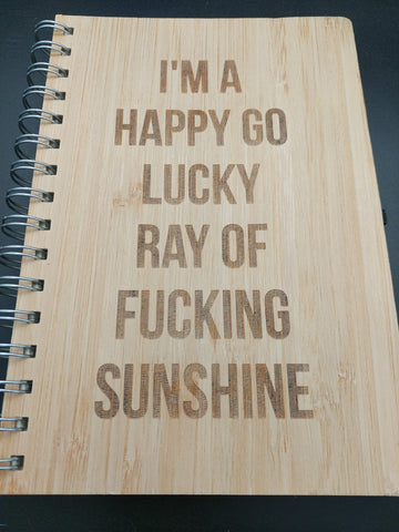 Bamboo notebook - I'm a happy go lucky ray of....